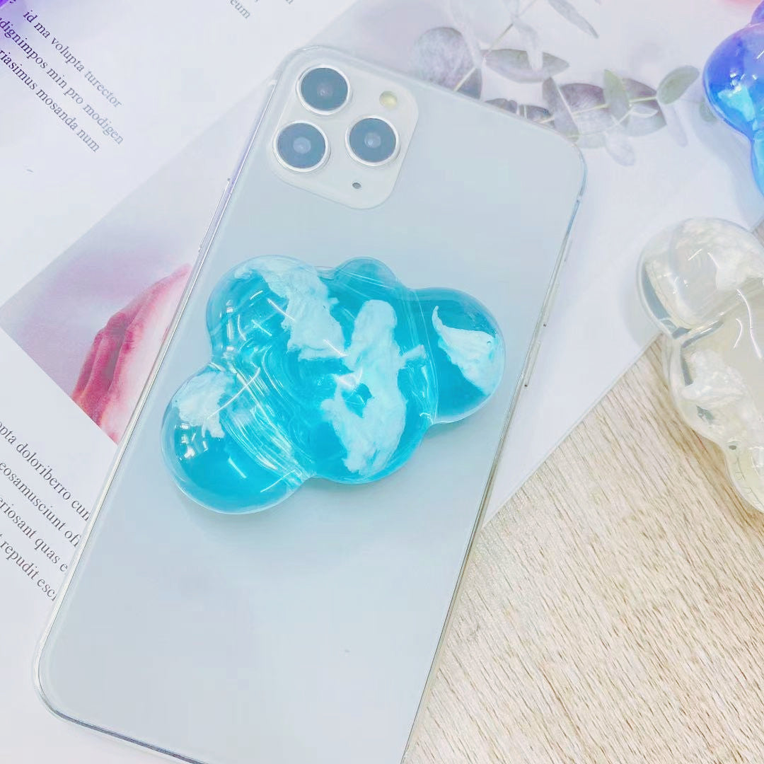 Titular de Airbag de teléfono móvil de nube estéreo transparente degradado al por mayor