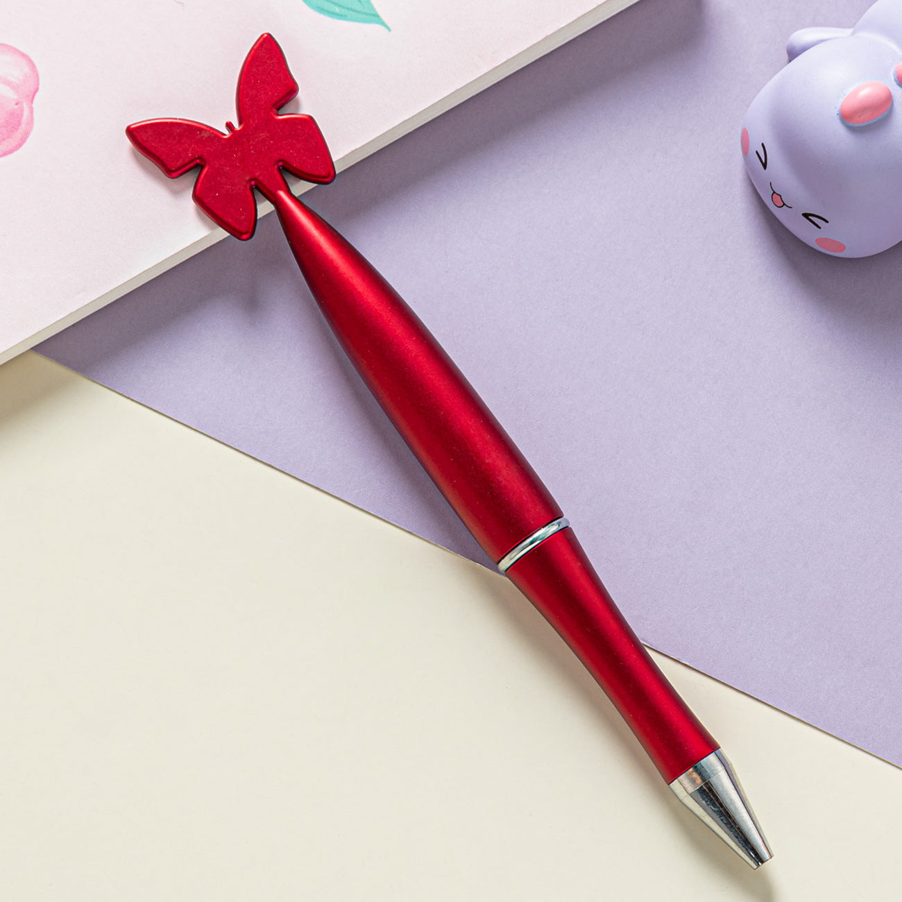 Venta al por mayor Bolígrafo De Plástico Giratorio De Mariposa