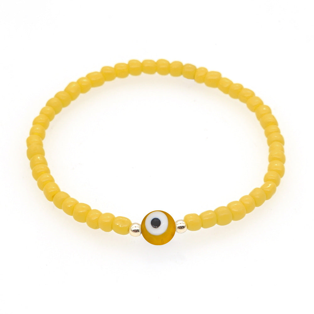 Venta al por mayor Devil Eyes White Glass Rice Beads Bracelet