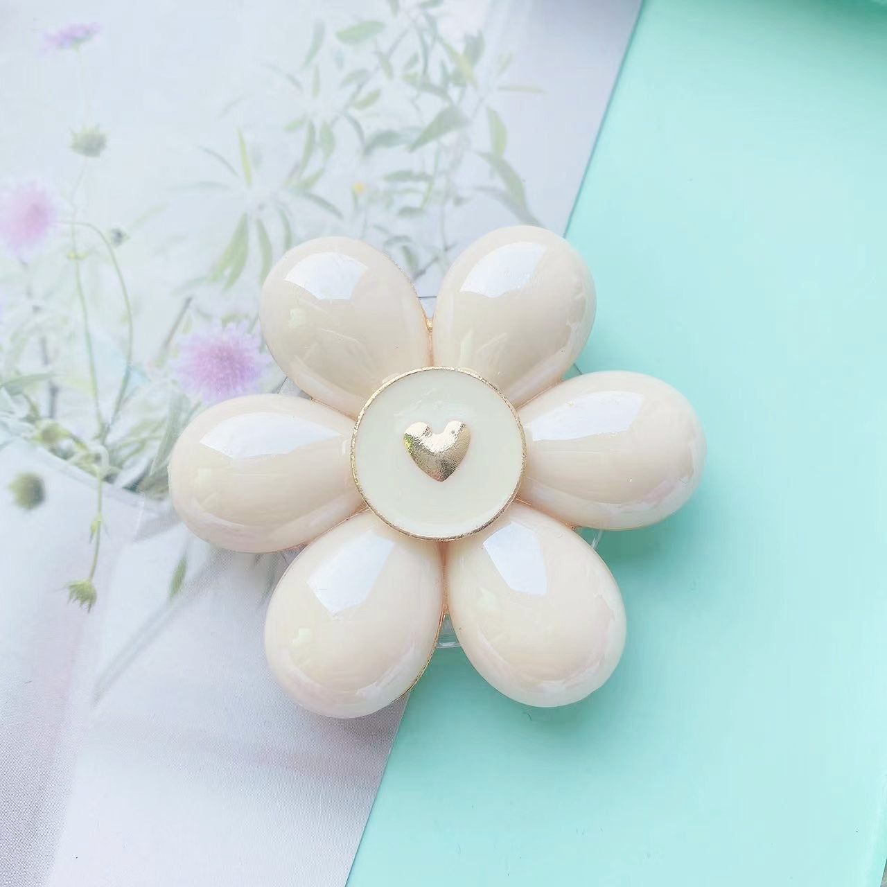 Soporte de teléfono móvil plegable Camellia de resina al por mayor