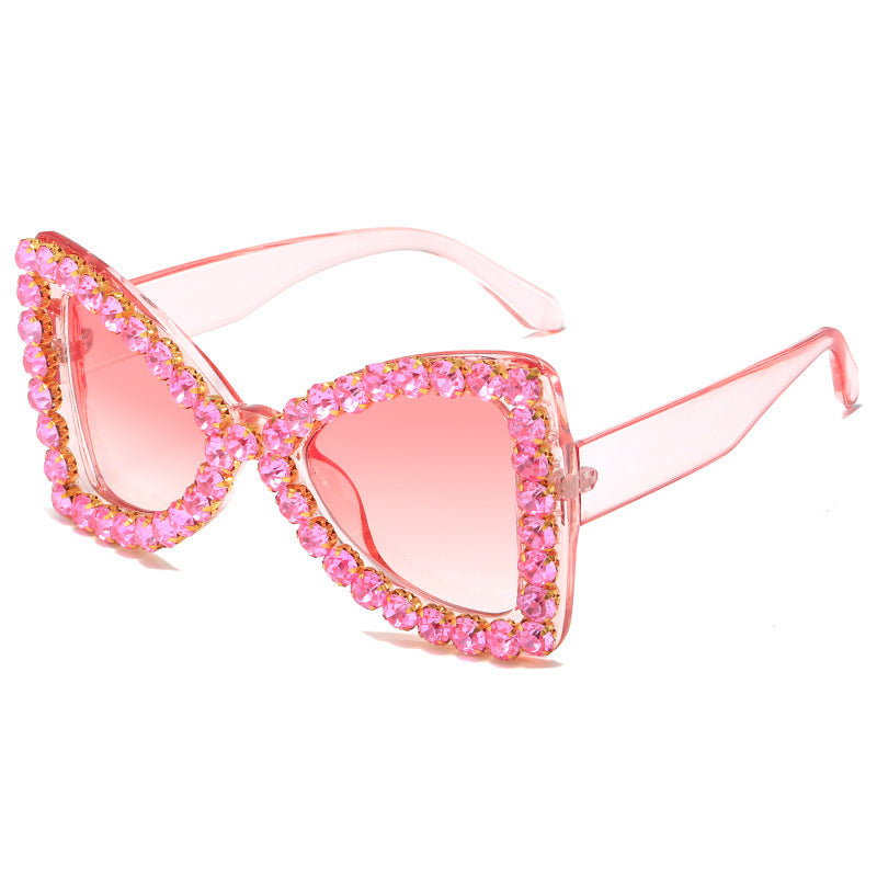 Venta al por mayor de marco grande Bowknot diamante PC gafas de sol
