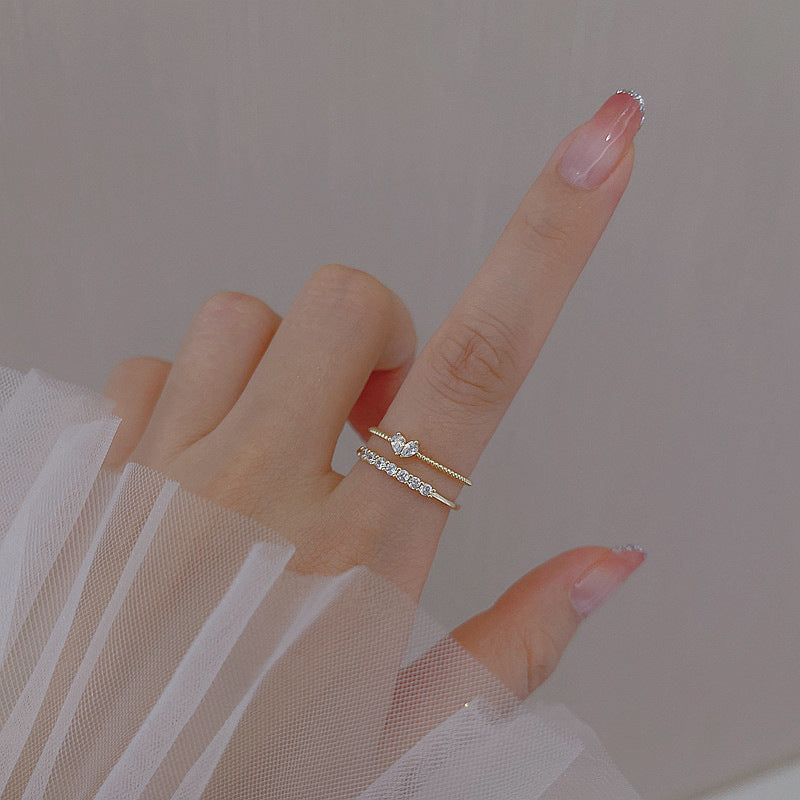 Anillos de diamantes de Heart Row de metal al por mayor