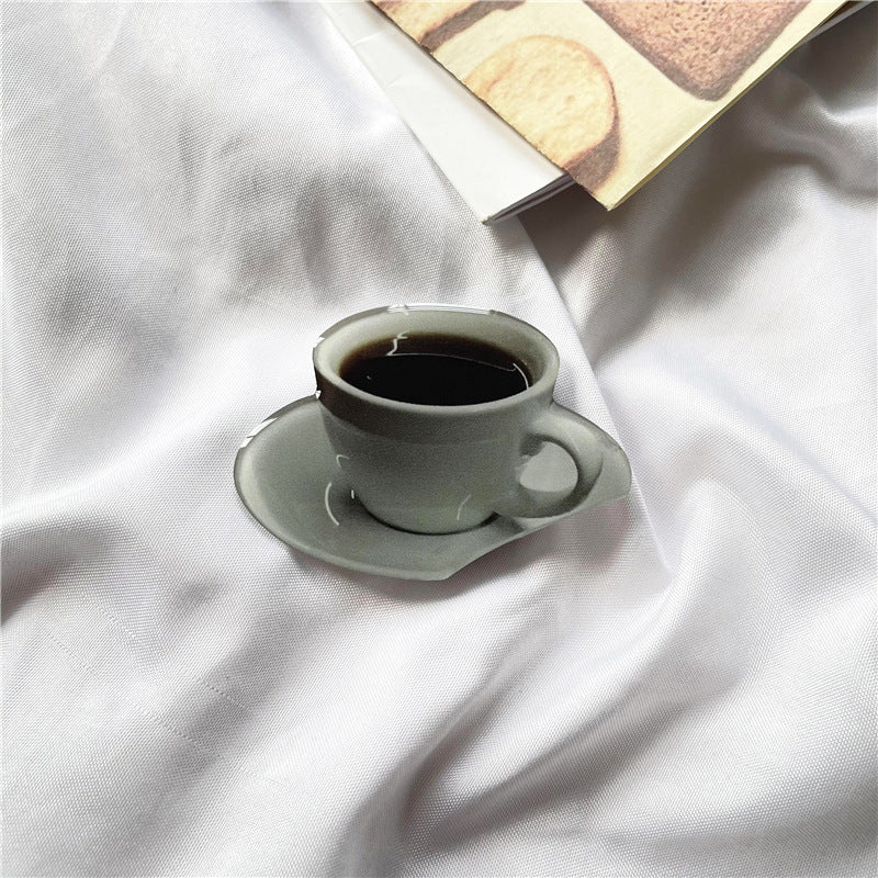 Venta al por mayor Torta de simulación Acrílico Airbag Soporte para teléfono móvil