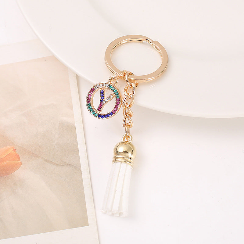 Venta al por mayor Llavero del alfabeto inglés de la borla de la aleación del cinc