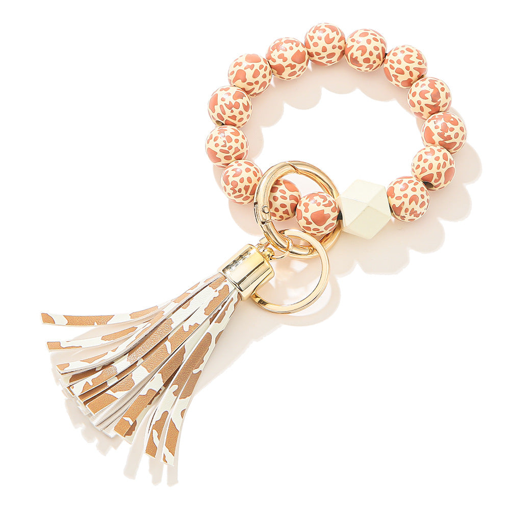 Llavero de muñeca con cuentas de madera con patrón manchado al por mayor