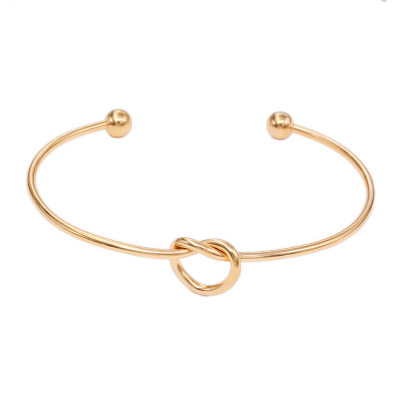 Pulsera De Acero De Titanio Con Corazón Anudado al por mayor