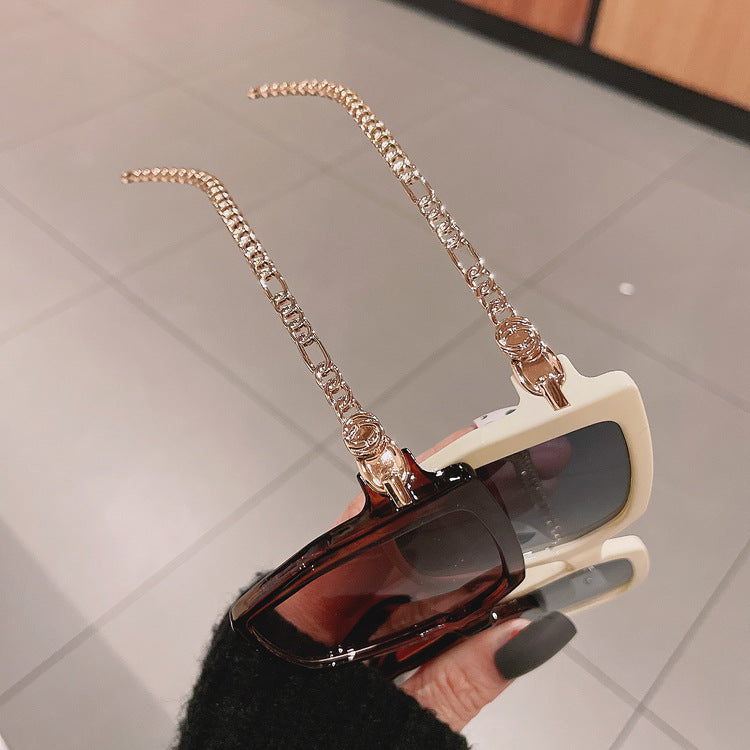 Venta al por mayor Gafas de sol de mujer con caja grande de cadena