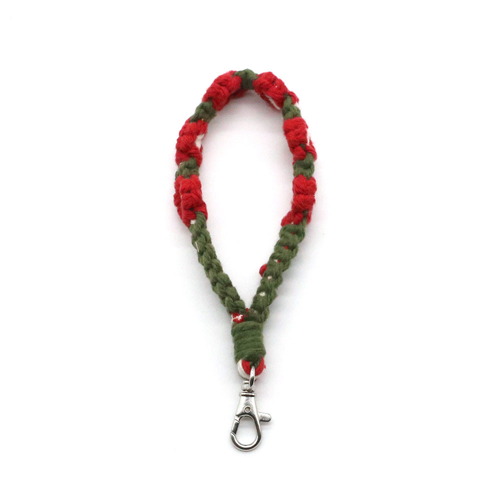 Venta al por mayor Llavero trenzado de flor pequeña de metal