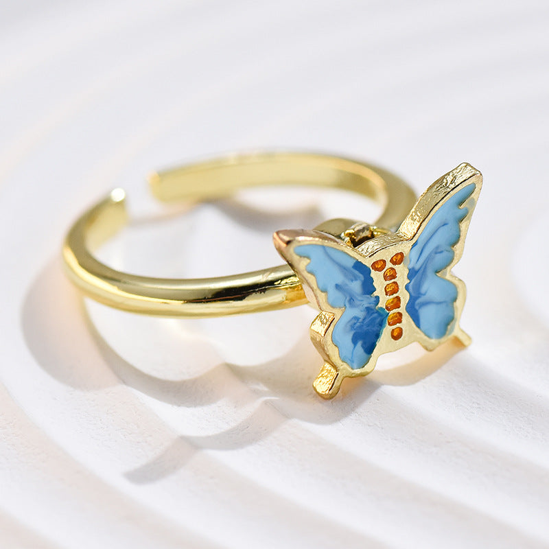 Wholesale Alloy Rotatable Daisy Flower Butterfly Ring