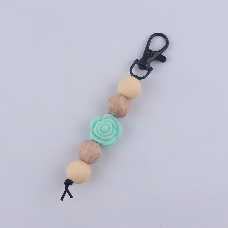 Llavero de cuentas de madera de rosa de silicona al por mayor