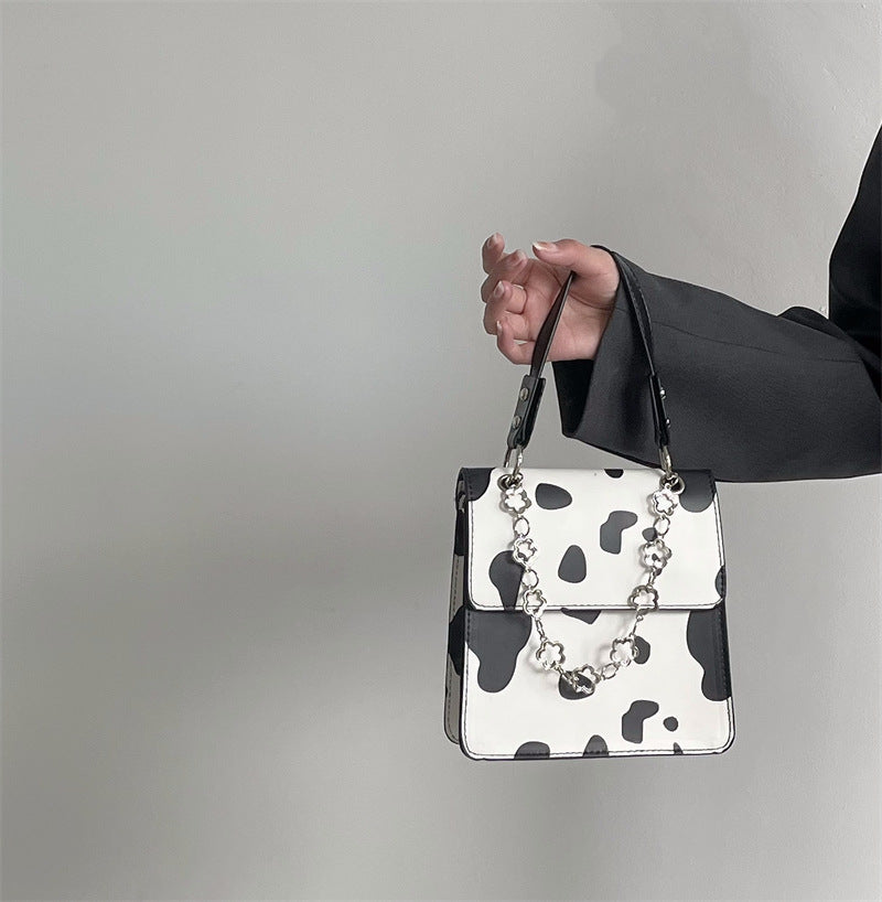 Wholesale Faux Leather Cow Pattern Small Square Shoulder Bag