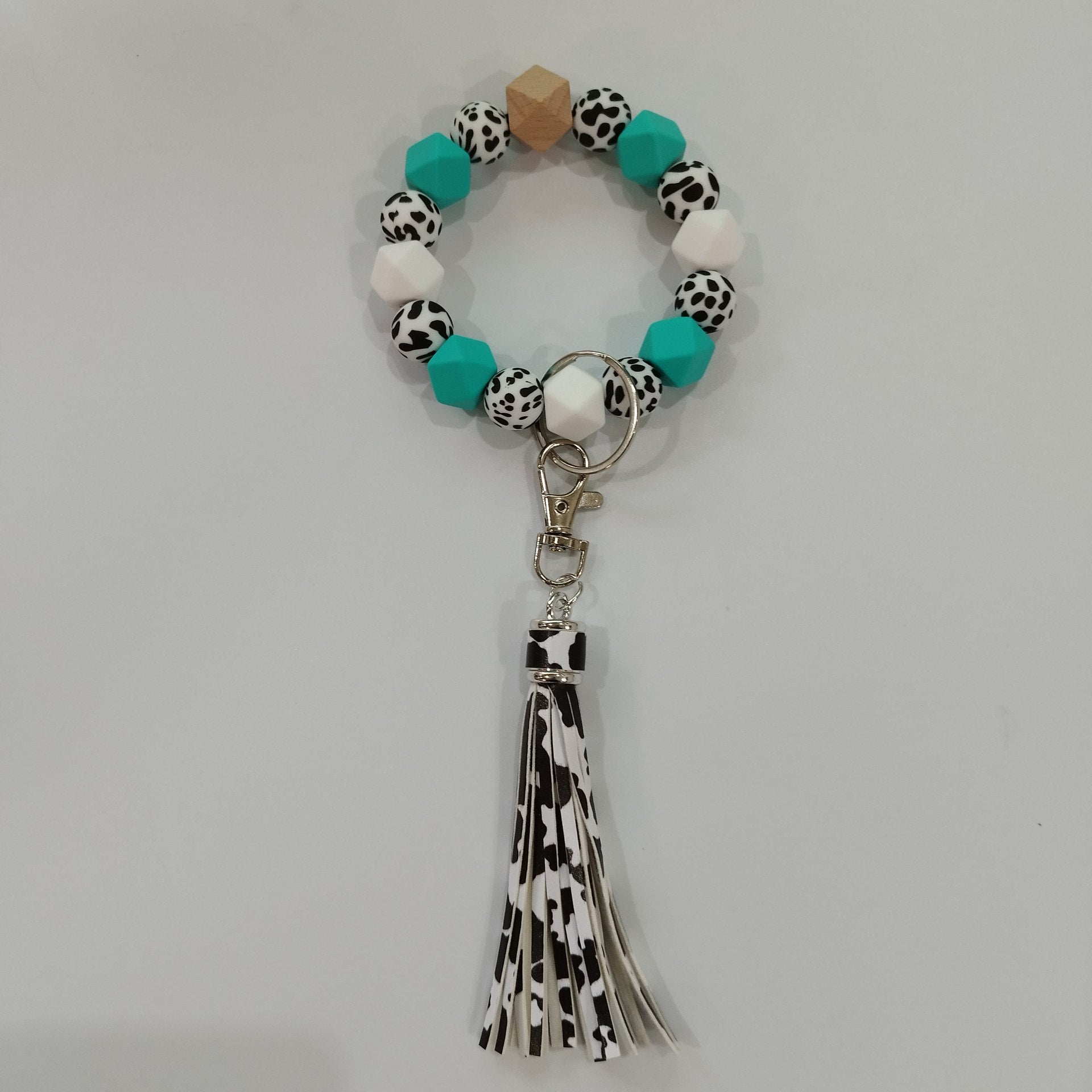 Comercio al por mayor Vaca Fringe Tarjeta Bolsa Silicona Beads Muñeca Llavero