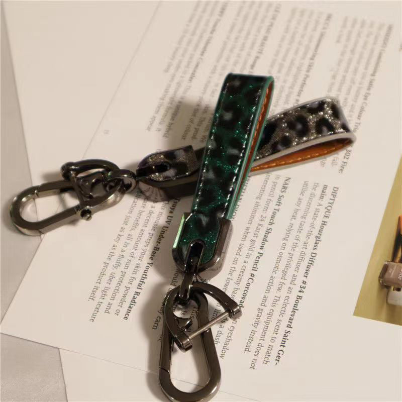 Wholesale 10PCS Zinc Alloy Double-sided Leopard Print Keychain