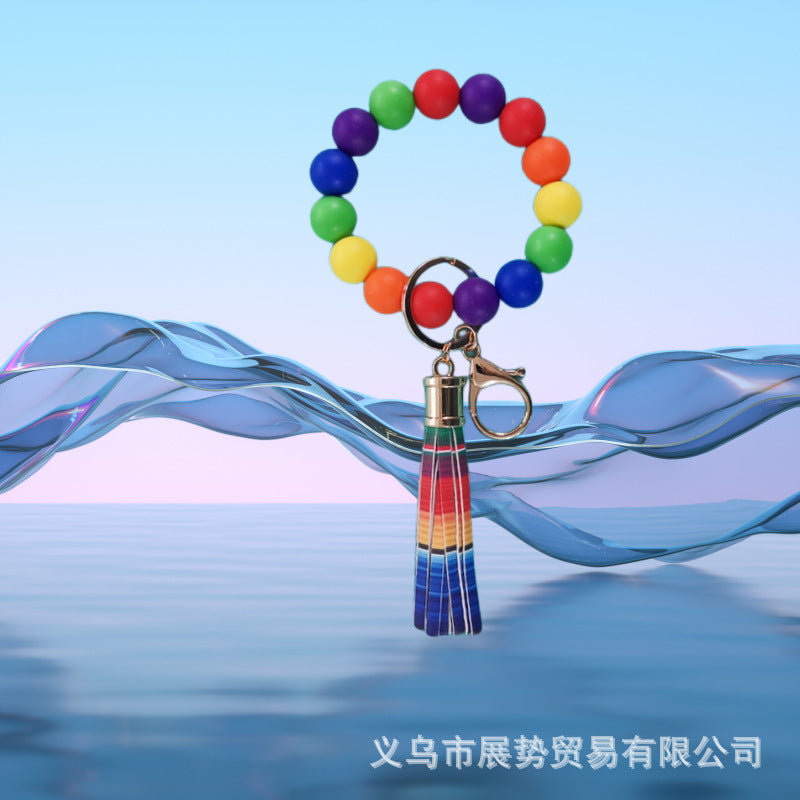 Venta al por mayor Llavero de muñeca con cuentas de silicona de girasol