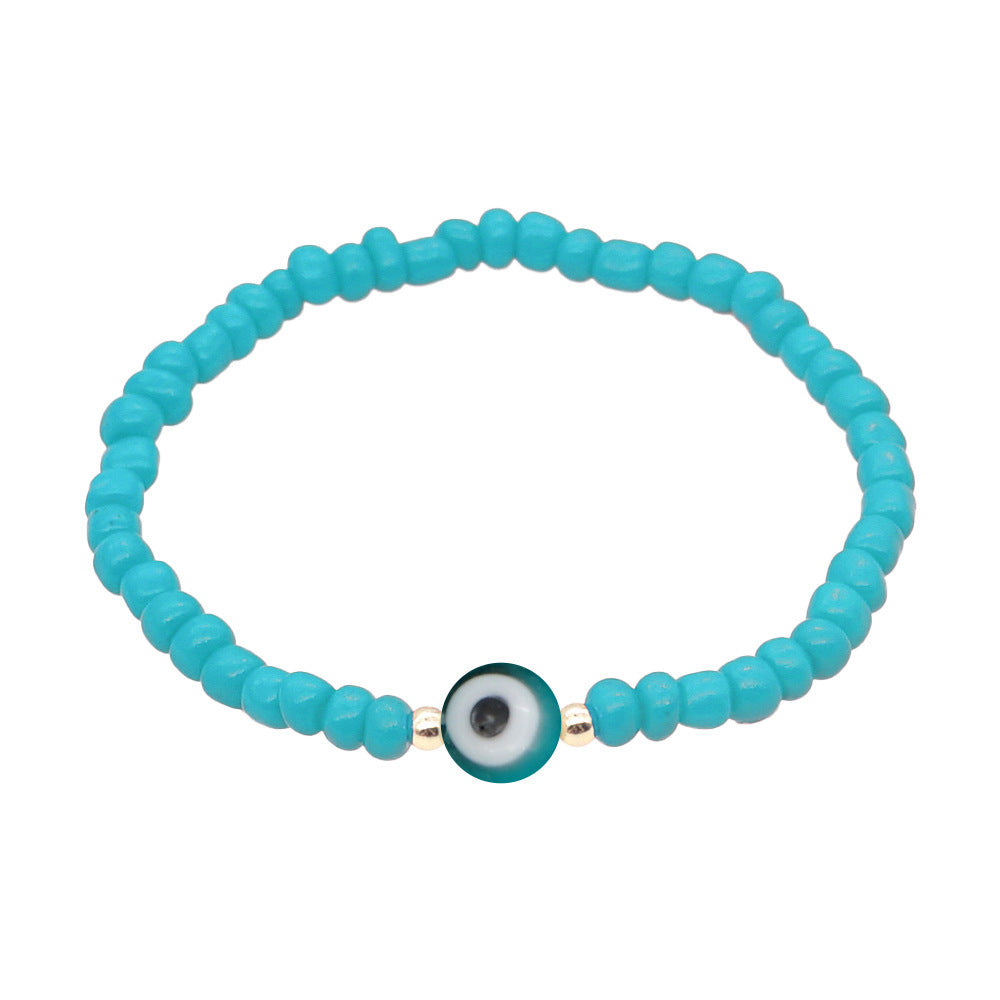 Venta al por mayor Devil Eyes White Glass Rice Beads Bracelet