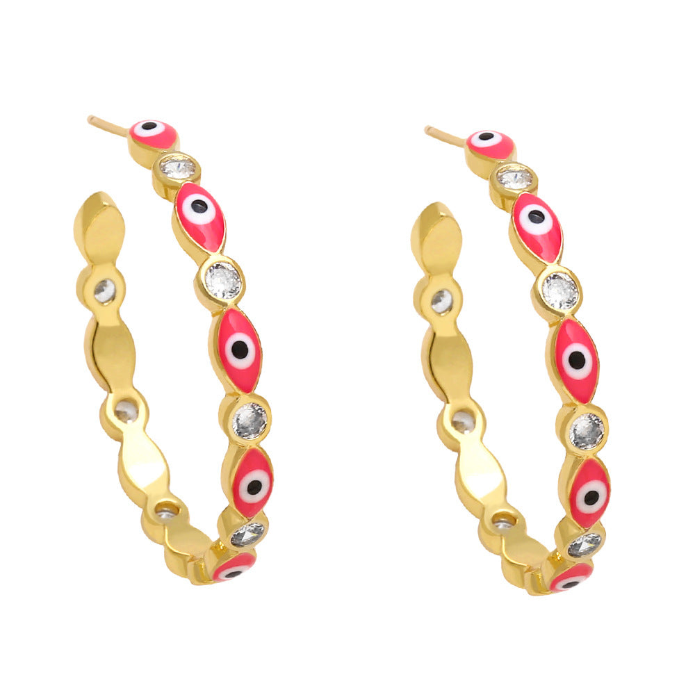 Comercio al por mayor colorido goteo de aceite ojo del diablo pendientes de cobre