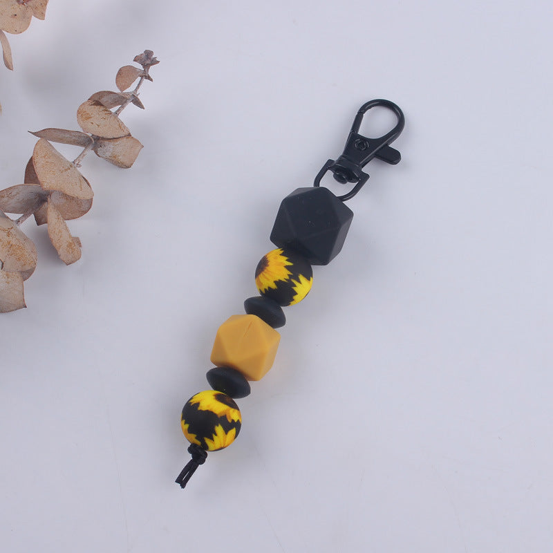 Llavero con cuentas de leopardo de silicona al por mayor