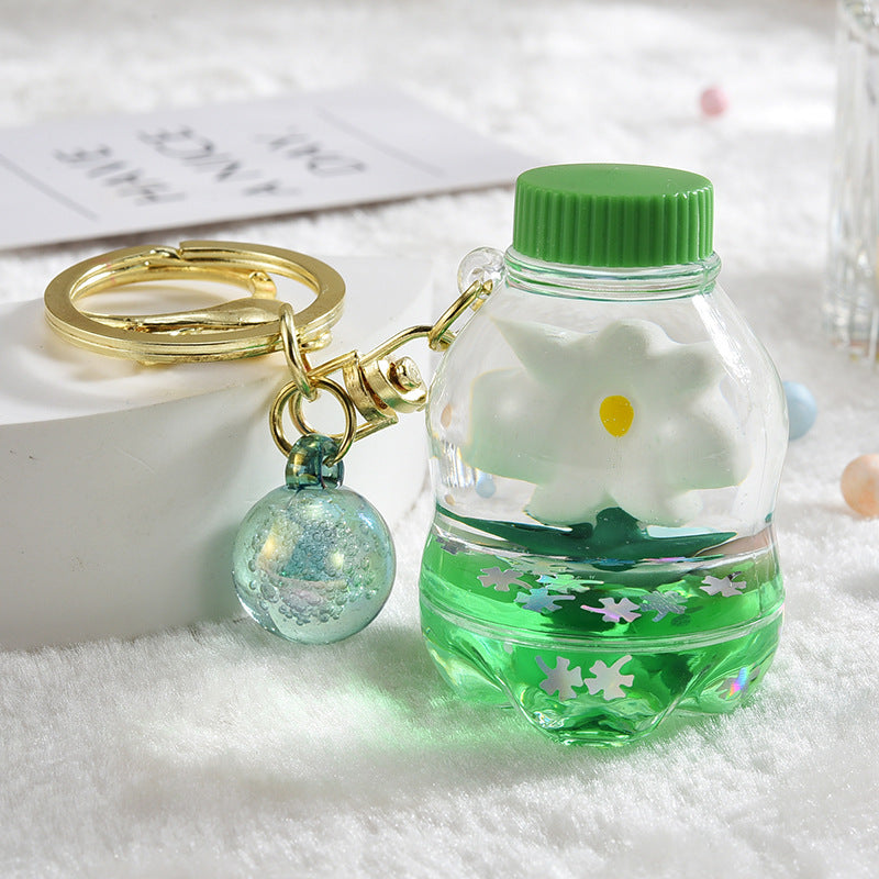 Llavero creativo de flores flotantes aceitadas de acrílico al por mayor