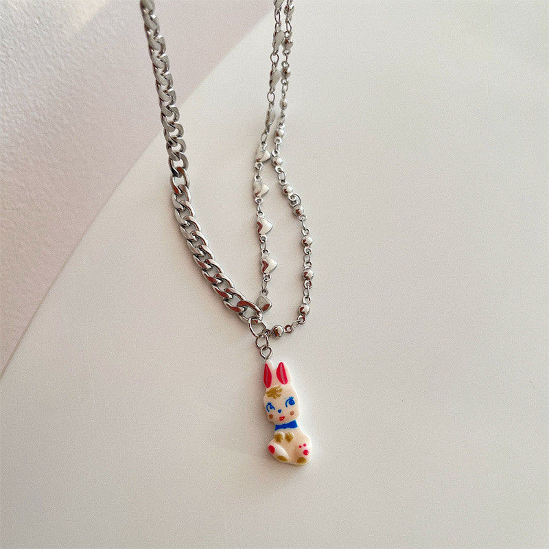 Venta al por mayor Pearl Bunny Collares De Acero De Titanio