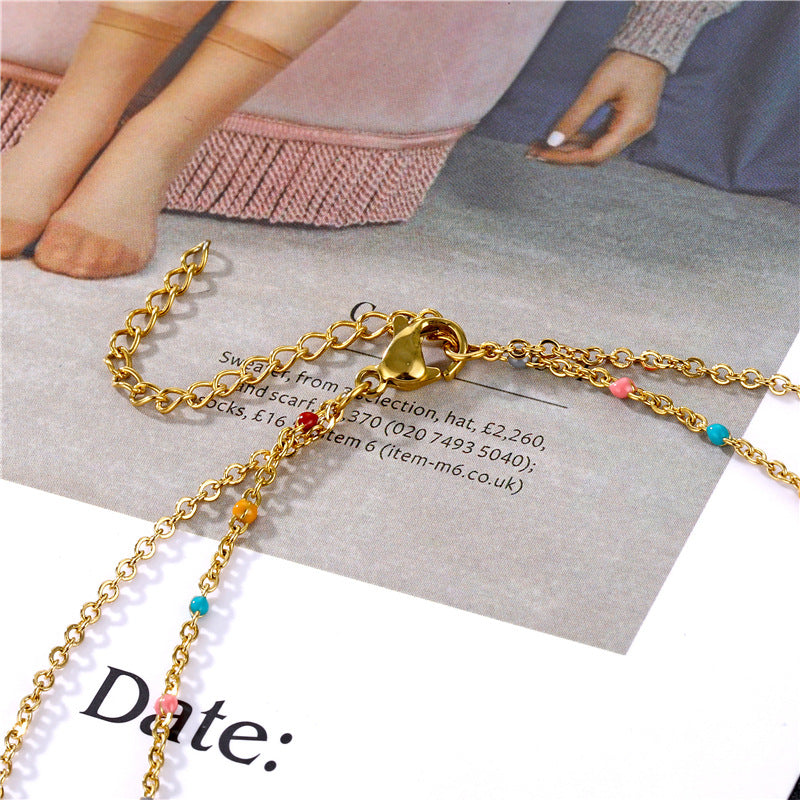 Collares de acero inoxidable con forma de corazón de doble capa al por mayor