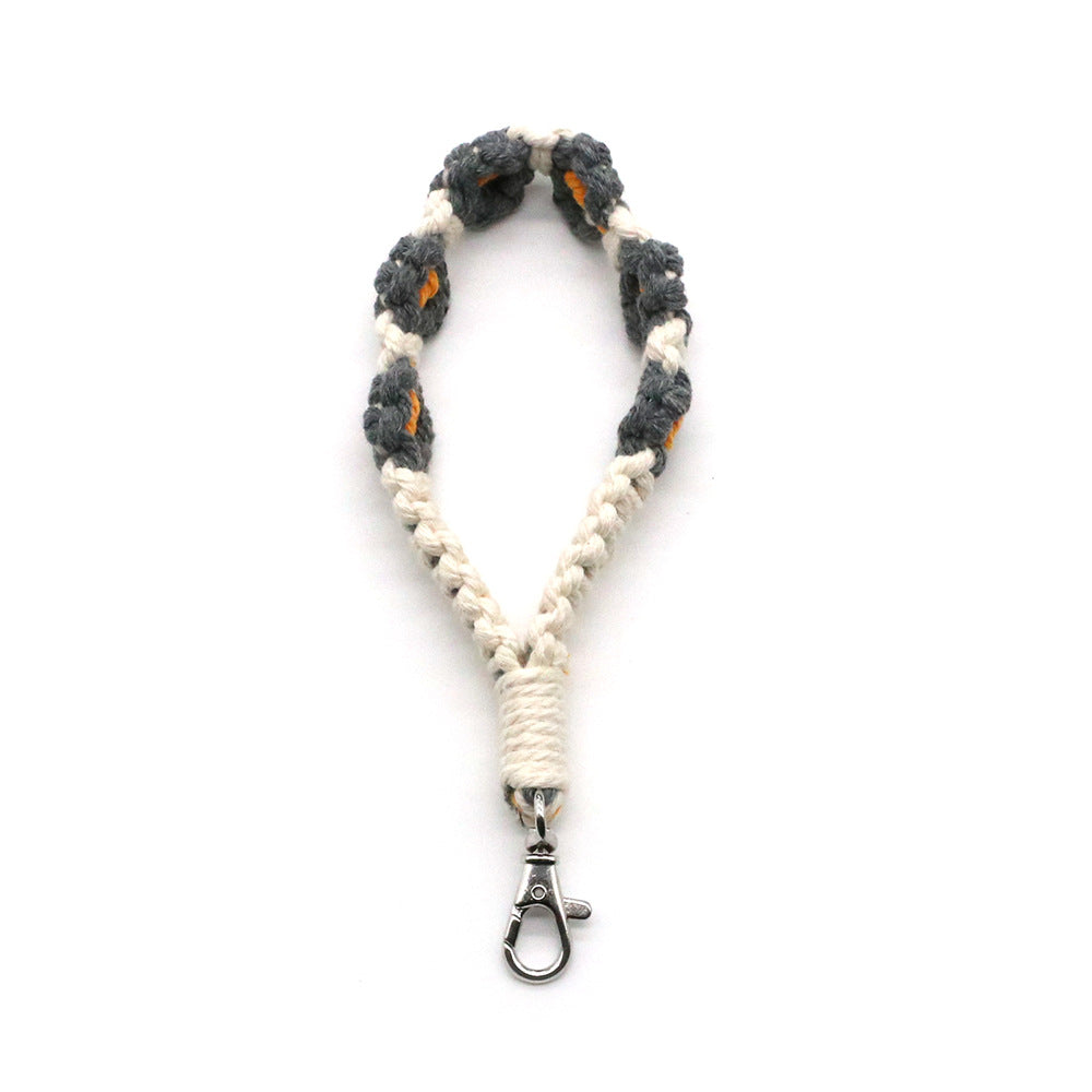 Venta al por mayor Llavero trenzado de flor pequeña de metal