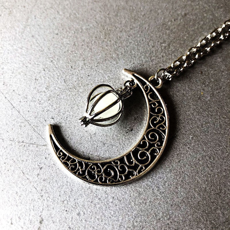 Wholesale Alloy Hollow Moon Heart Birdcage Luminous Beads Pendant Necklace