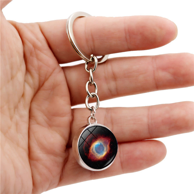 Llavero creativo al por mayor de la nebulosa de la galaxia del ojo de Dios de la aleación del cinc