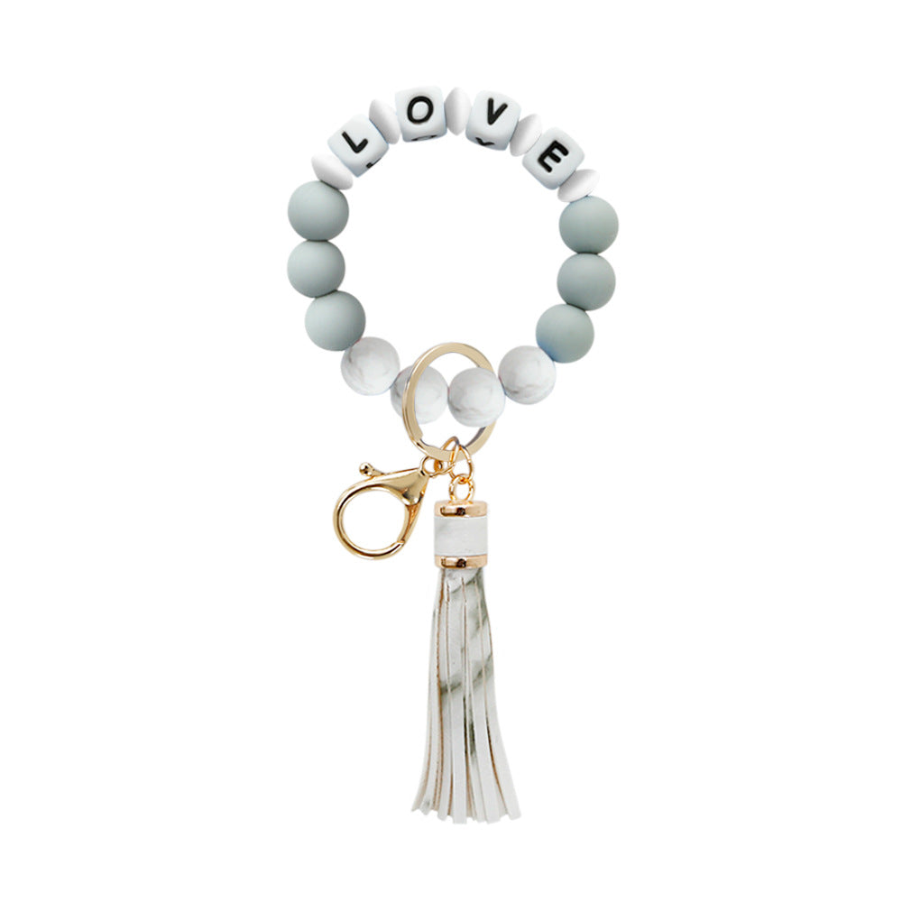 Wholesale LOVE Letters Silicone Beaded Tassel Wrist Keychain