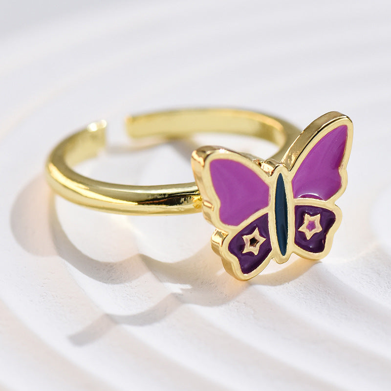 Wholesale Alloy Rotatable Daisy Flower Butterfly Ring
