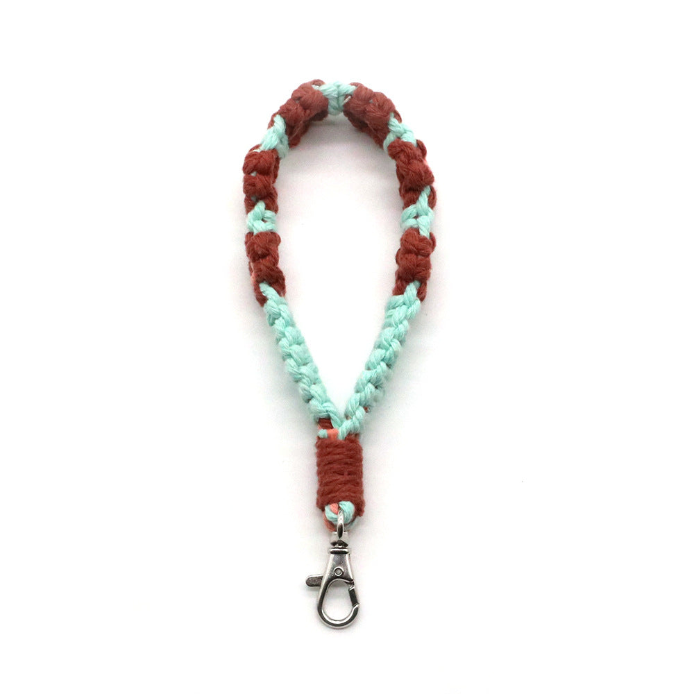 Venta al por mayor Llavero trenzado de flor pequeña de metal