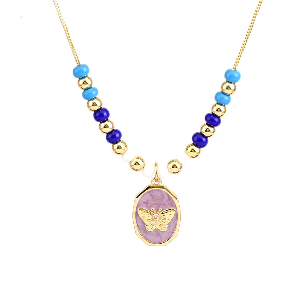 Collar con colgante de ojo mágico en forma de corazón de cobre al por mayor