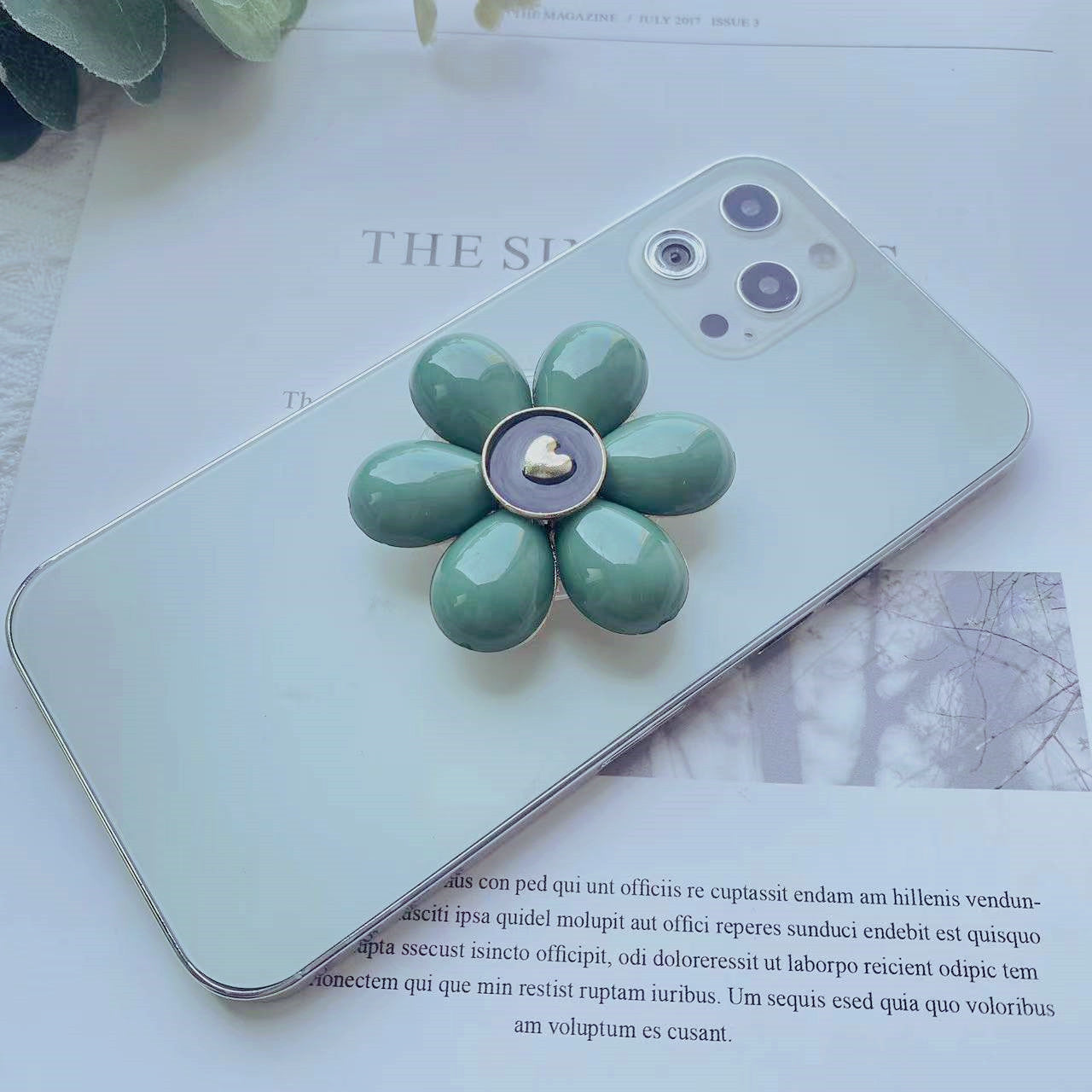 Soporte de teléfono móvil plegable Camellia de resina al por mayor