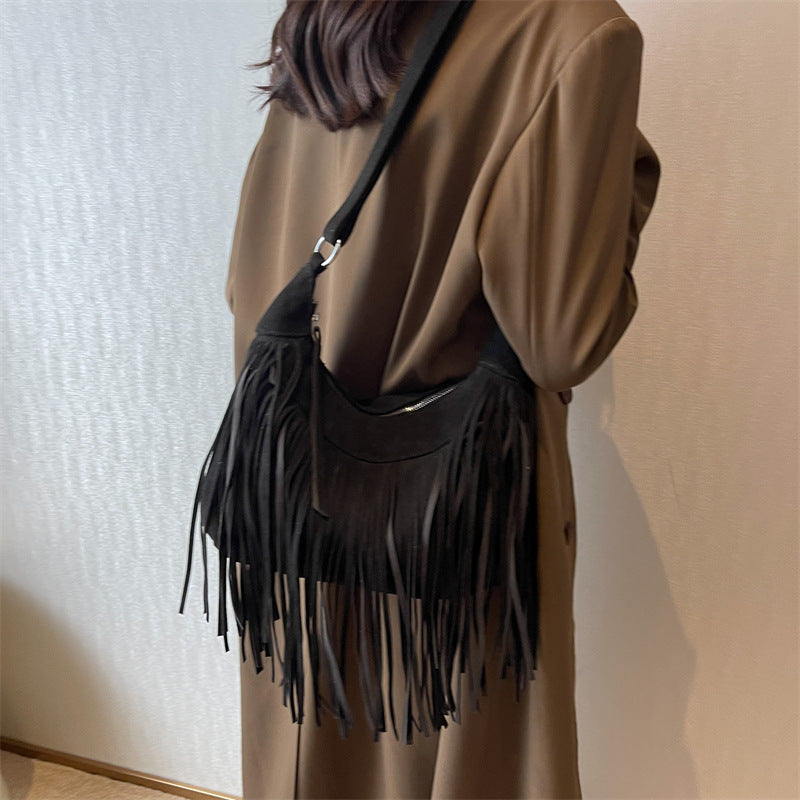 Venta al por mayor Bolso de hombro con borla esmerilada de poliéster