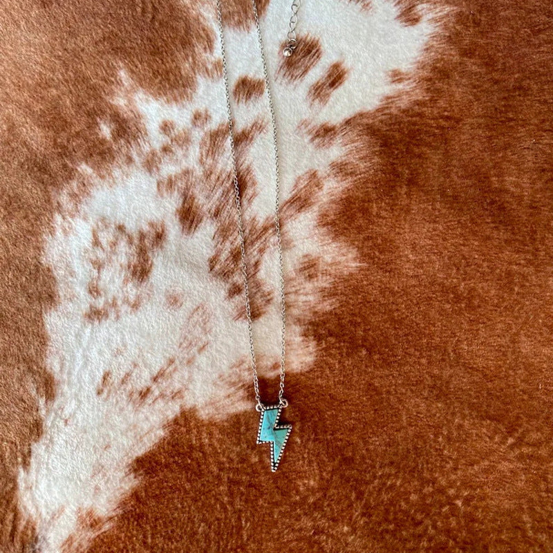 Venta al por mayor, collar con colgante de relámpago turquesa creativo de aleación