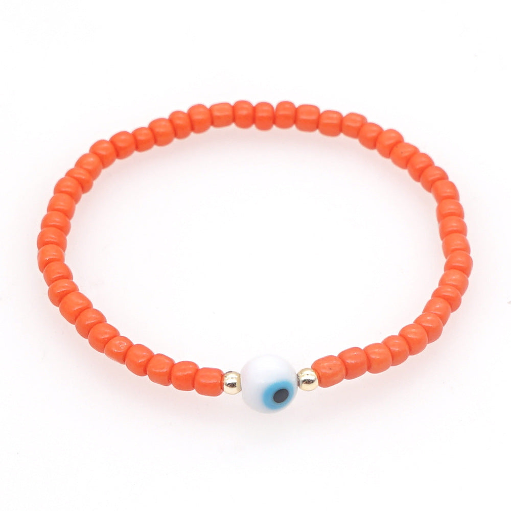 Venta al por mayor Devil Eyes White Glass Rice Beads Bracelet