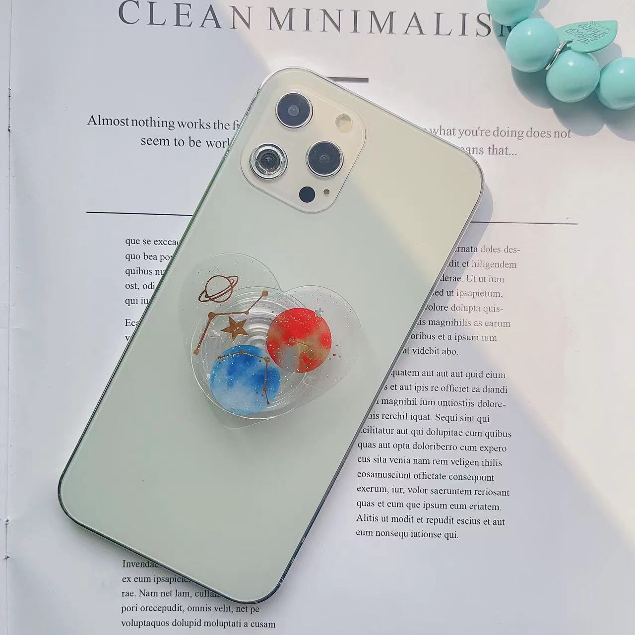 Tenedor transparente al por mayor del airbag del teléfono móvil del polvo fino del planeta de la forma del corazón