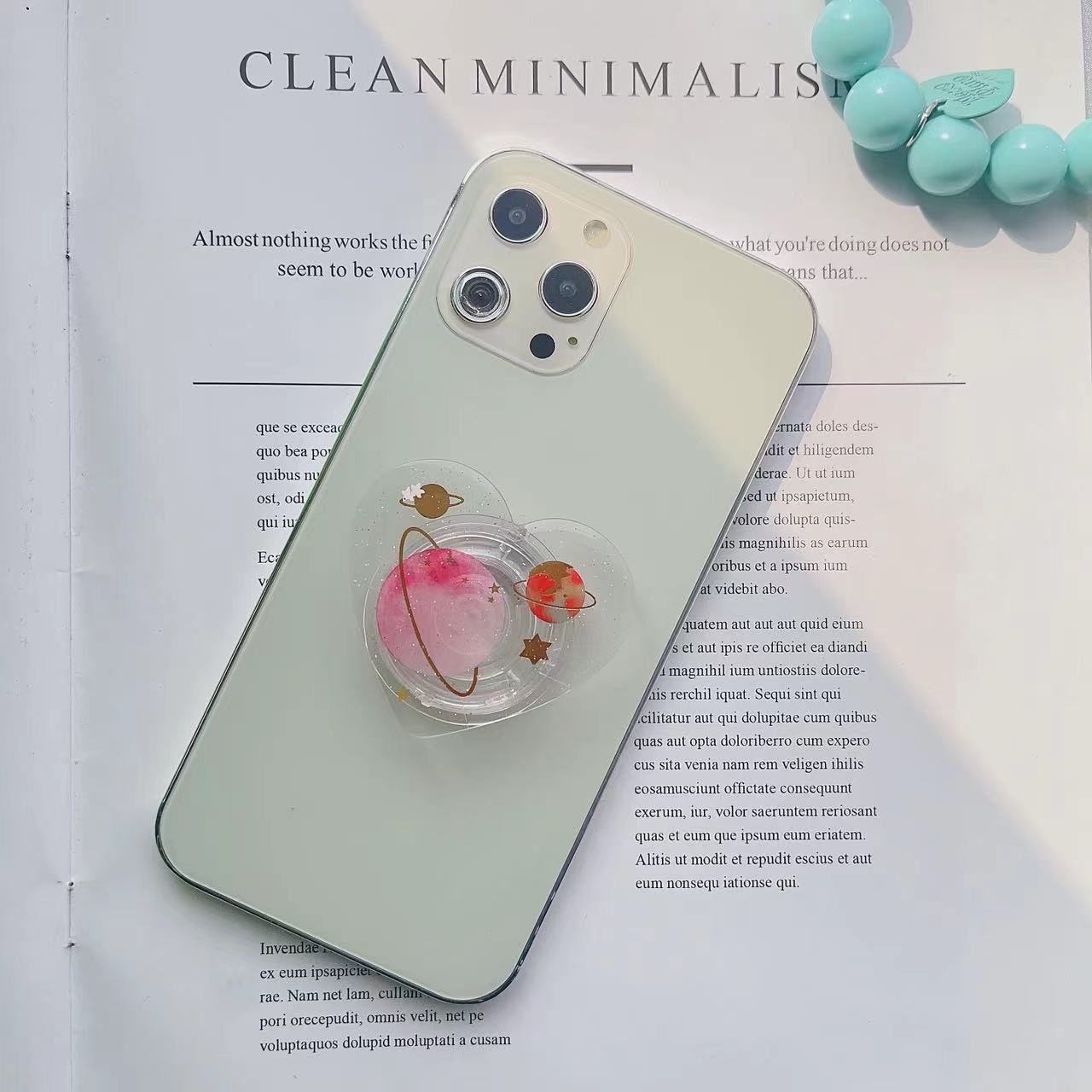 Tenedor transparente al por mayor del airbag del teléfono móvil del polvo fino del planeta de la forma del corazón