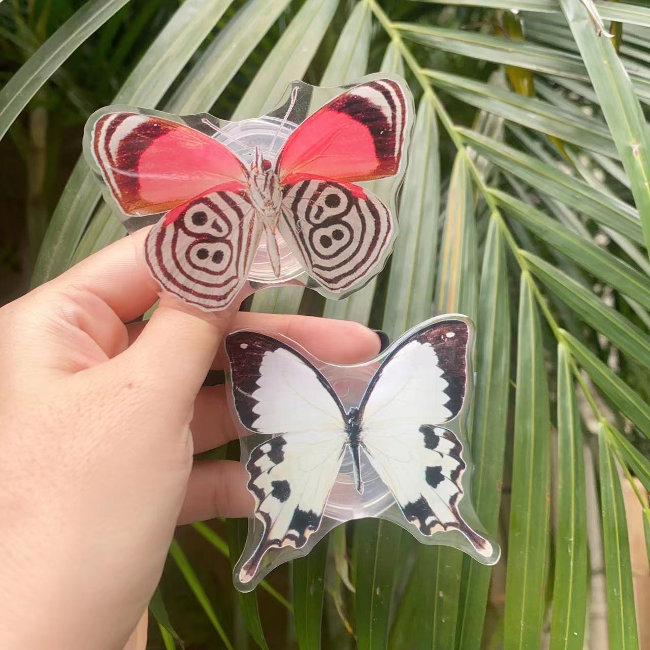 Venta al por mayor Soporte de teléfono móvil de mariposa pintada de acrílico