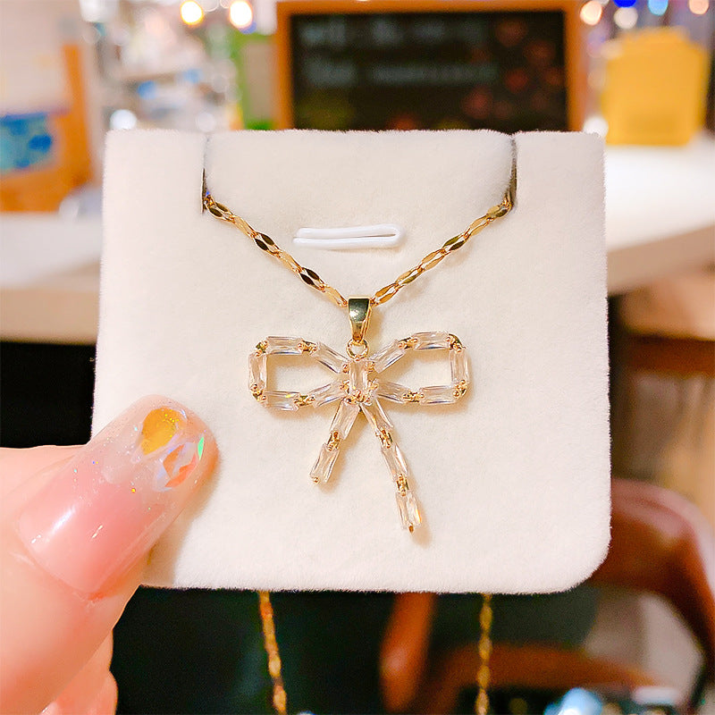 Wholesale 12pcs/pack Titanium Steel Bow Pendant Necklace Earring Set