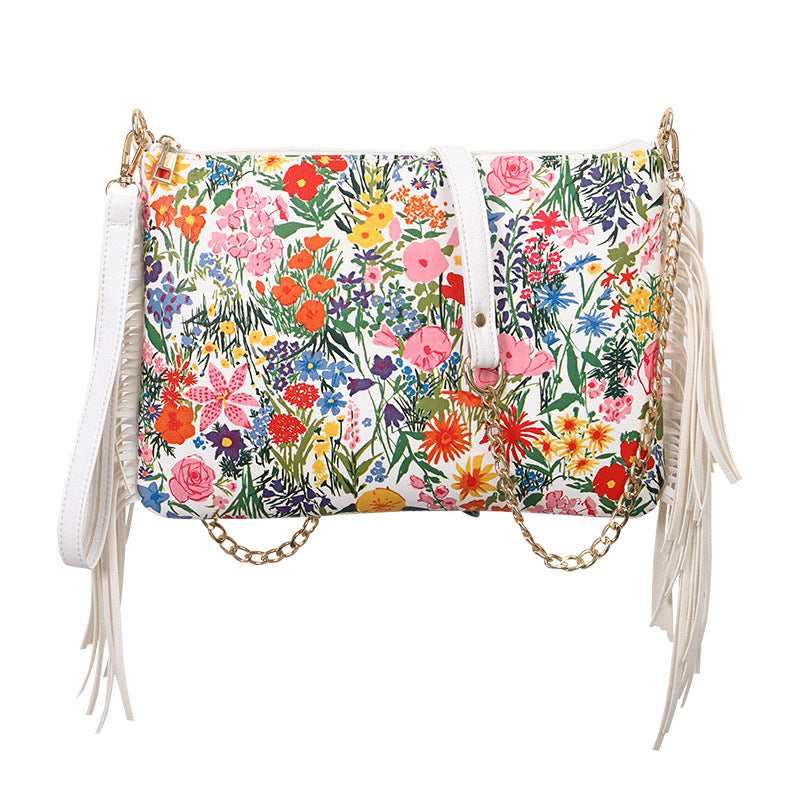 Bolso de hombro con estampado de flores grandes y borlas de PU al por mayor