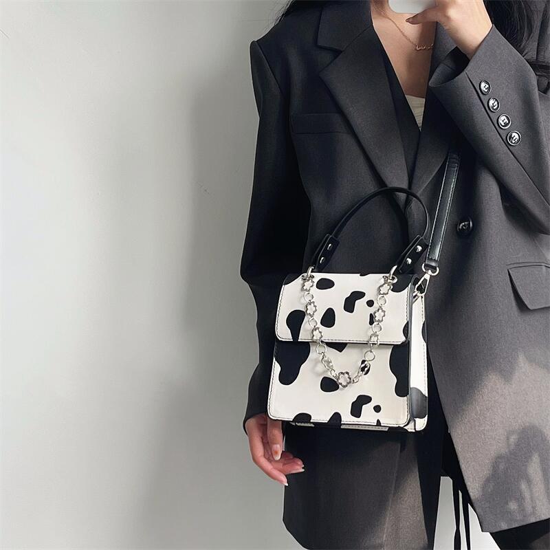 Wholesale Faux Leather Cow Pattern Small Square Shoulder Bag