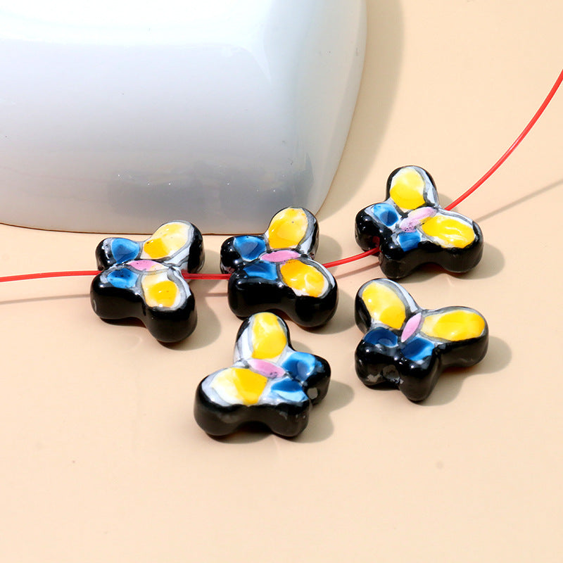 Color al por mayor Peeds de la cadena de cerámica de mariposa pintada a mano.