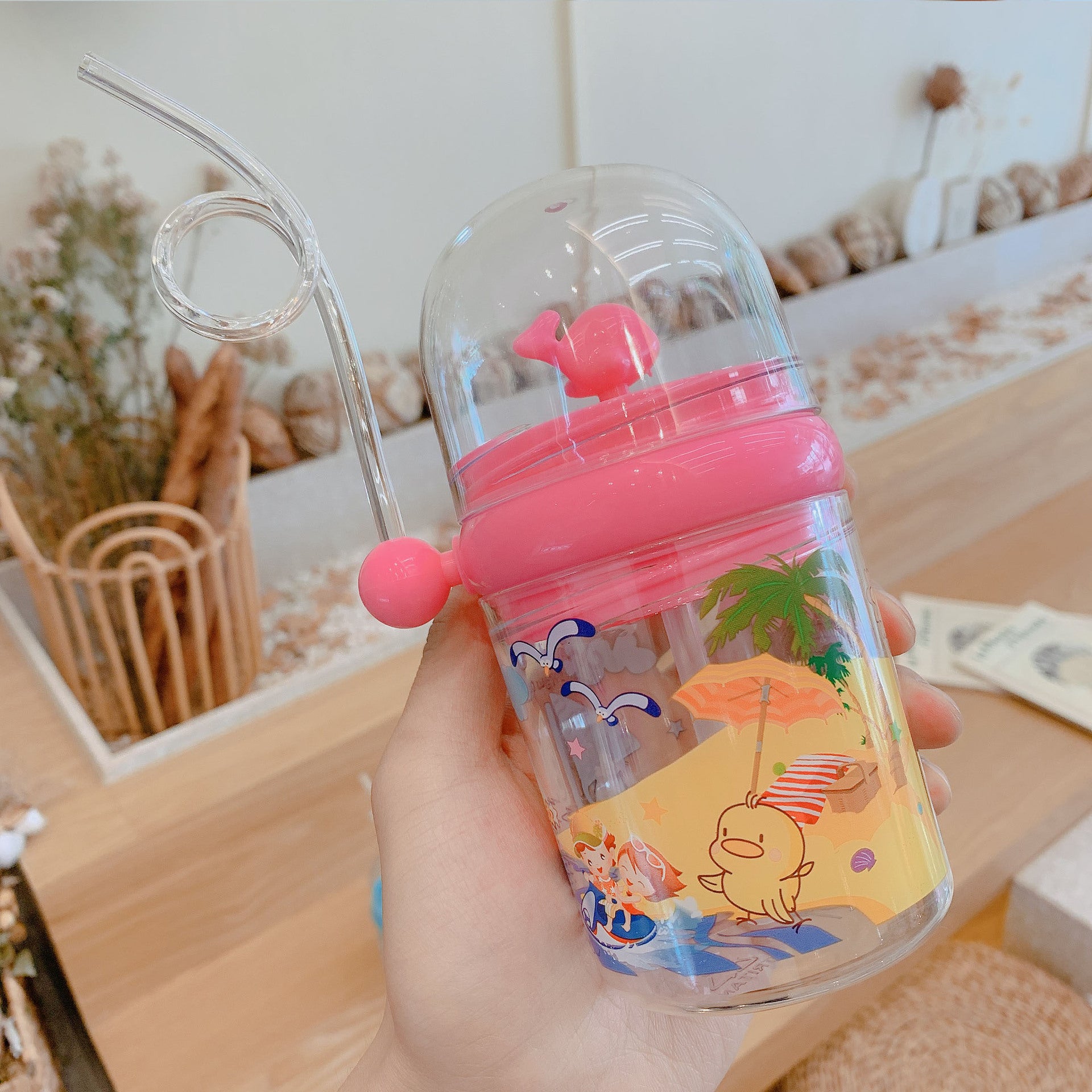 Wholesale Water spray whale cup children's portable anti-fall plastic cup with scale windmill