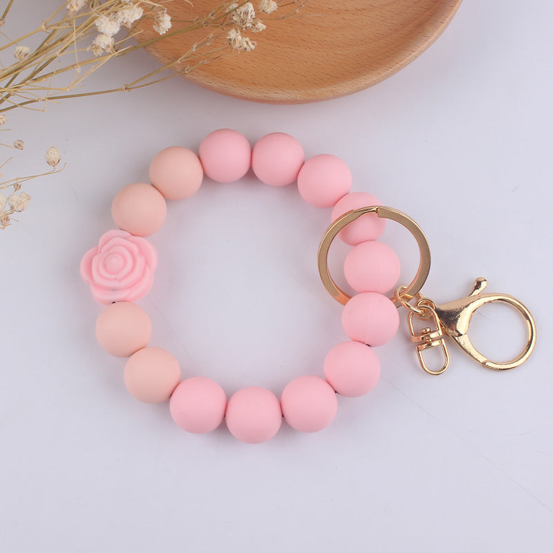 Llavero de muñeca de silicona de Pu Tassel al por mayor