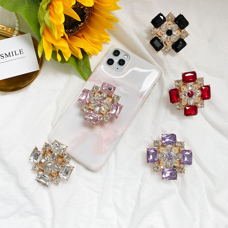 Venta al por mayor Soporte para teléfono móvil con bolsa de aire de diamantes de imitación