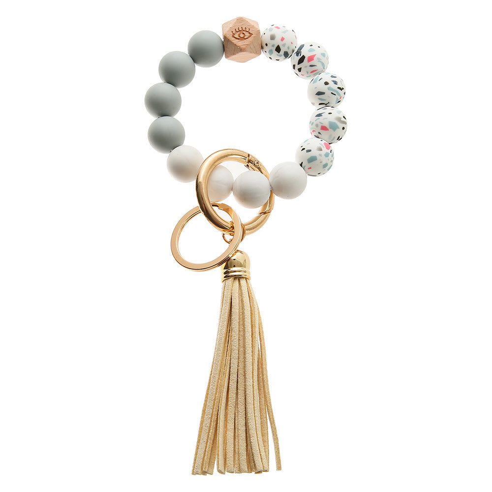 Llavero de muñeca con cuentas de silicona de leopardo colorido al por mayor
