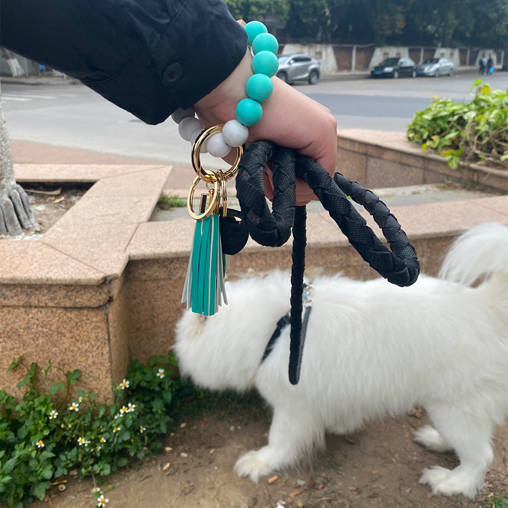 Comercio al por mayor borla de cuero colgante de cuentas de silicona llavero de muñeca