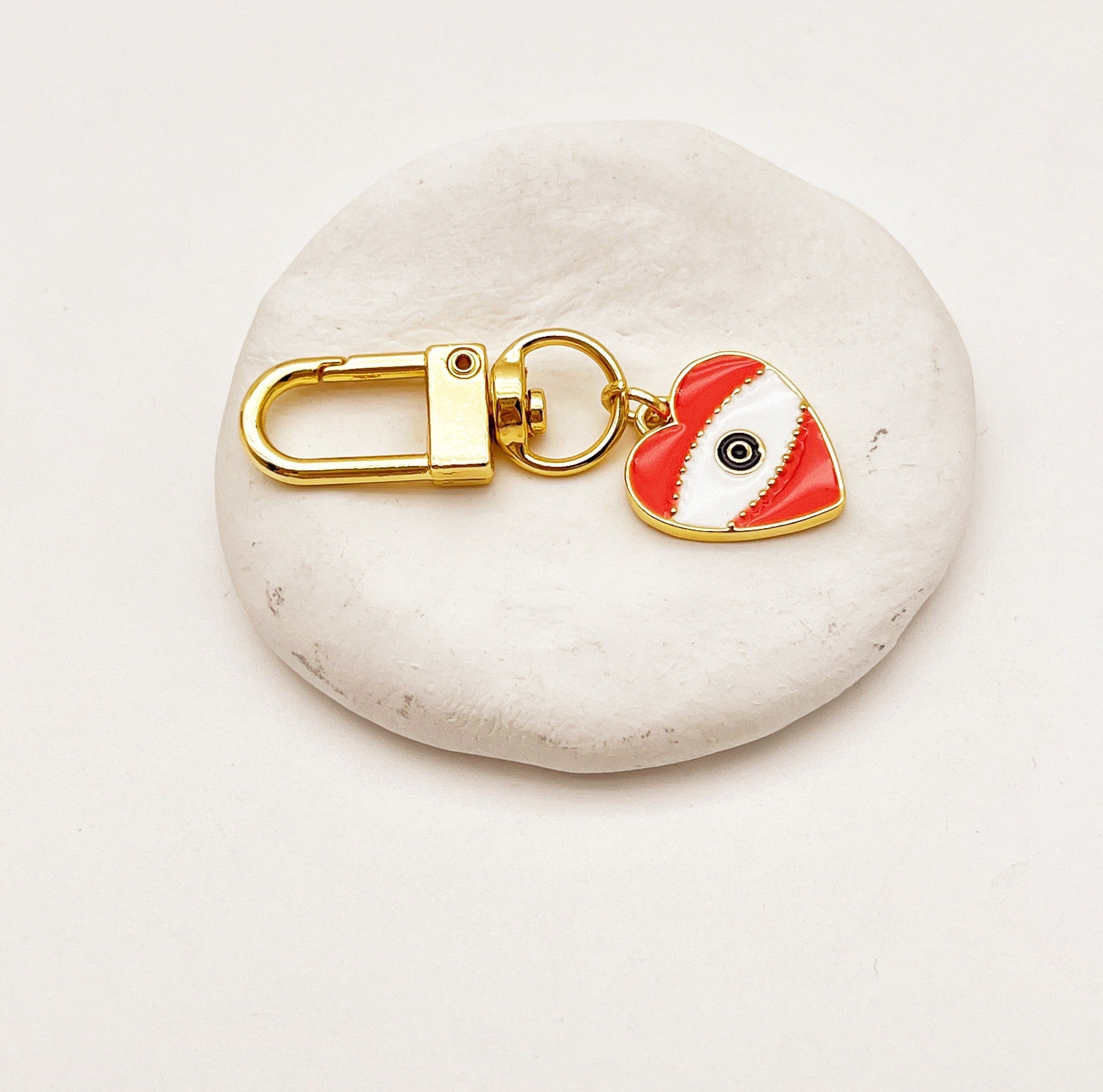 Venta al por mayor Llaveros De La Aleación Del Corazón Del Ojo Del Diablo