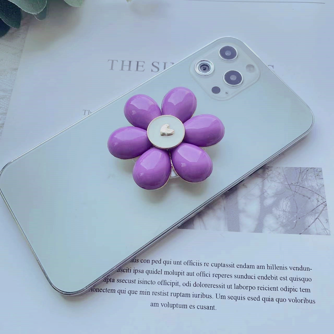 Soporte de teléfono móvil plegable Camellia de resina al por mayor