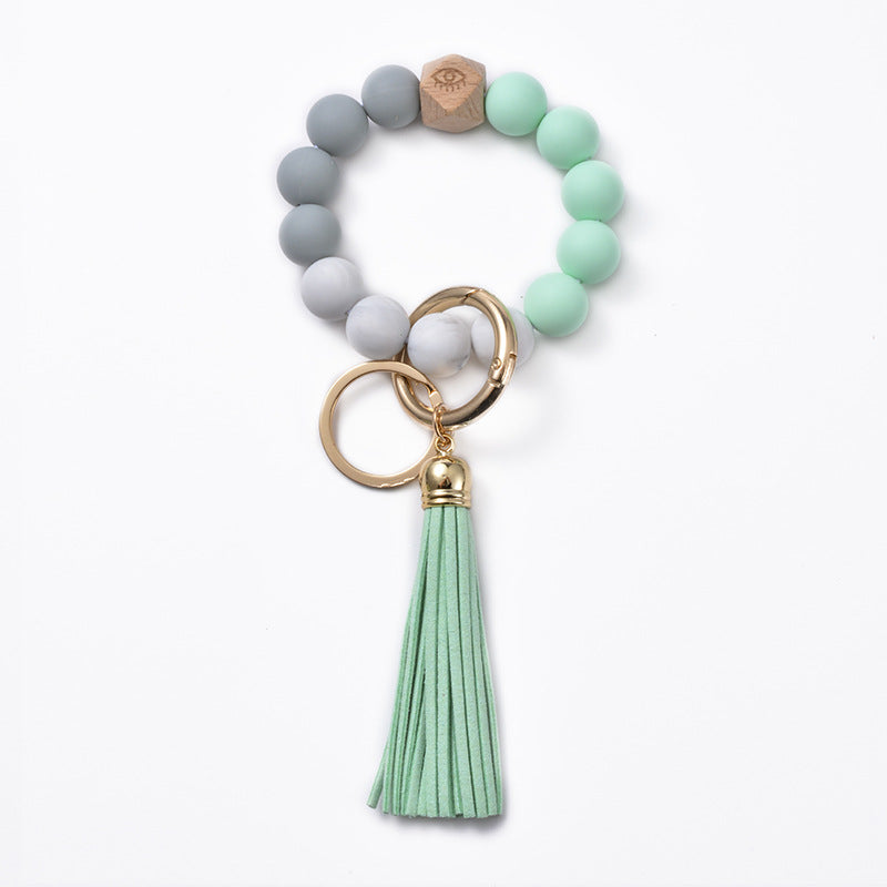Llavero de muñeca con cuentas de silicona al por mayor